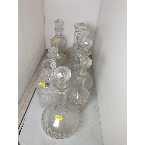 381 - A quantity of glass Decanters, mostly with stoppers