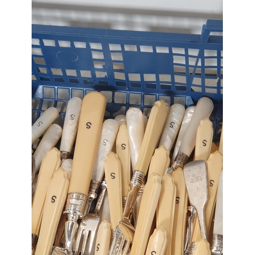 385 - A quantity of plated Ware including a pair of Candlesticks, Biscuit Barrel, Tea Service, Tea Knives ... 