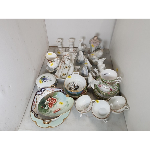 386 - A quantity of Nao and other  Figures of Ducks, Doves etc Dishes, Teaware, Dressing Table China etc