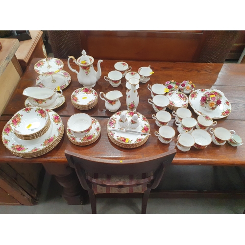 399 - A Royal Albert 'Old Country Rose' part dinner/tea service with cake stand, cups and saucers, jug etc