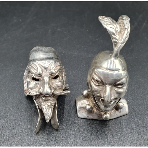 44 - A pair of continental Mask Heads of Caviello and Pantalone, named and marked 800