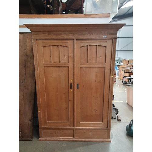 467 - A Large Pine Wardrobe