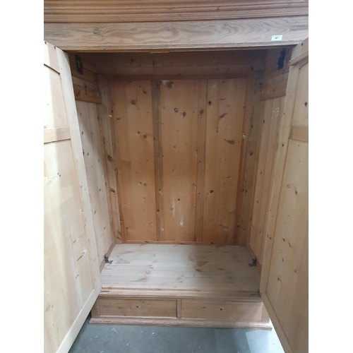 467 - A Large Pine Wardrobe