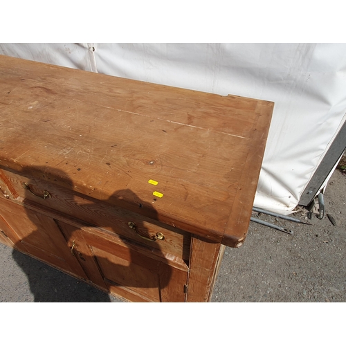 472 - A large Pitch Pine kitchen unit fitted three large drawers above four cupboard doors H3ft 3