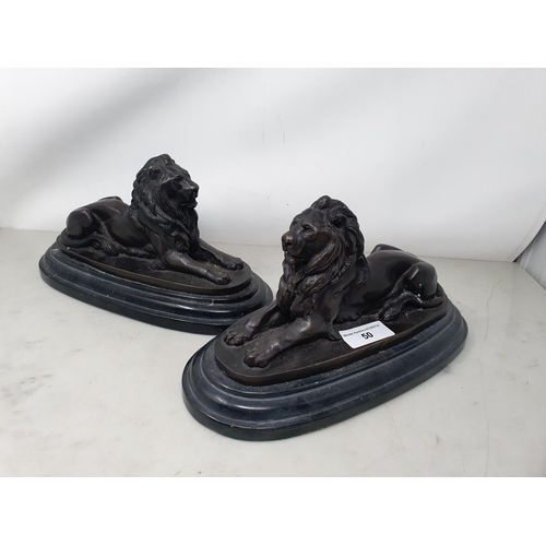 50 - After BARRIE, a pair of bronze Recumbent Lions on oval bases