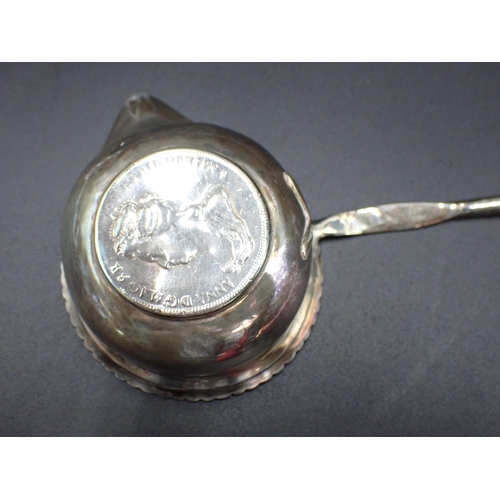 54 - A George IV Punch Ladle with coin inset silver bowl, gadroon rim and spiral whalebone handle, London... 