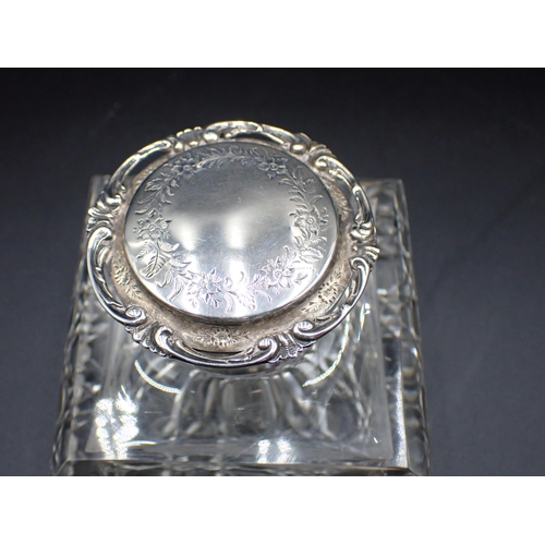 55 - An Edward VII silver lidded and mounted heavy square cut glass Inkwell with floral engraving and scr... 