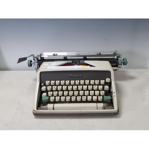 568 - An Olympia de luxe portable Typewriter c.1970