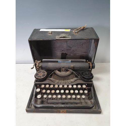 569 - An Underwood 3-bank portable Typewriter with case