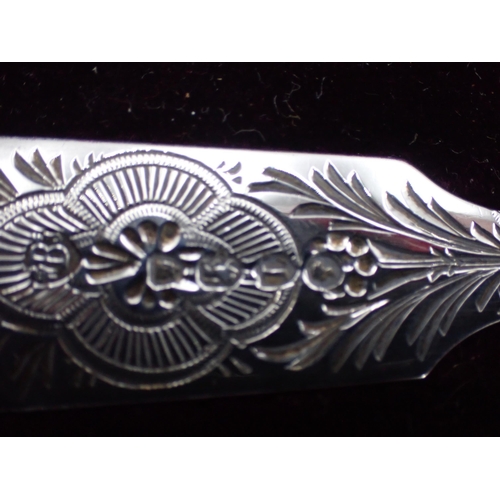 64 - A Victorian silver Christening Knife, Fork and Spoon with bright-cut decoration, London 1886/8, in c... 