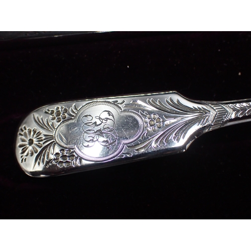 64 - A Victorian silver Christening Knife, Fork and Spoon with bright-cut decoration, London 1886/8, in c... 