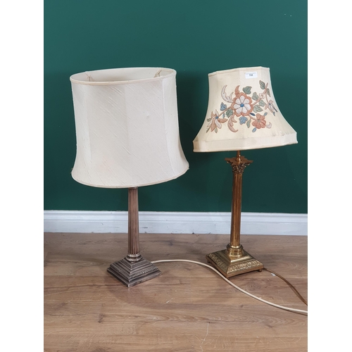 708 - A silver plated Corinthian column Table Lamp and shade, and another brass Corinthian Column Table La... 