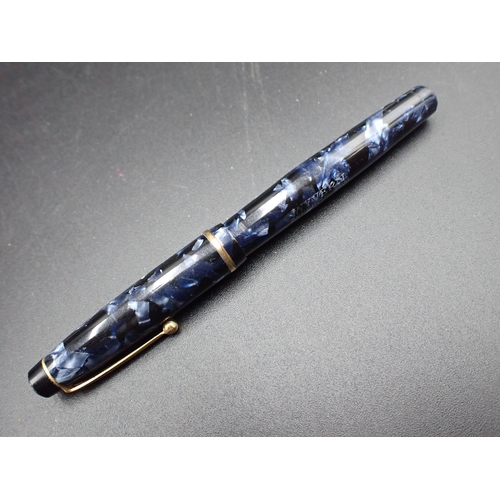 72 - A George VI silver cased Fountain Pen with engine turning, Birmingham 1941, two others in silver cas... 