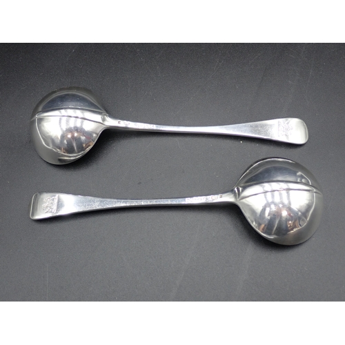 75 - A pair of Victorian silver Sauce Ladles, hanoverian pattern, engraved crests, rat tail bowls, London... 