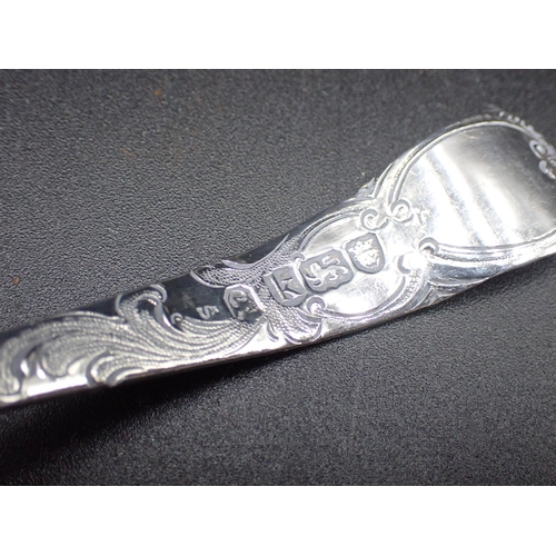 84 - A George III silver Sifting Spoon with fruit embossed bowl, trellis pattern stem with vacant cartouc... 