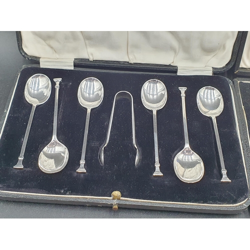 92 - Three sets of six silver Coffee Spoons, two with tongs and cased