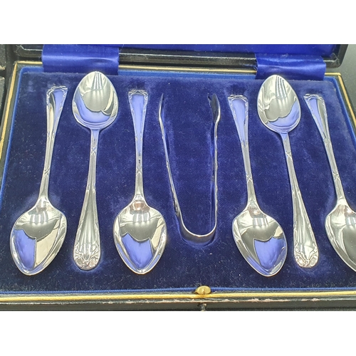 92 - Three sets of six silver Coffee Spoons, two with tongs and cased