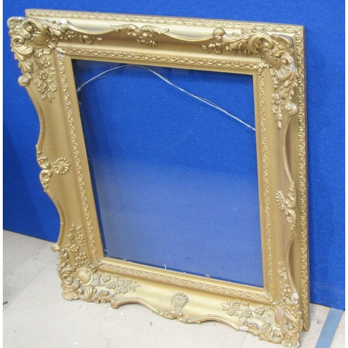 415 - A 19th Century rosewood veneer Frame, rebate size 18½ x 14¾in; together with two 19th Century gilded... 