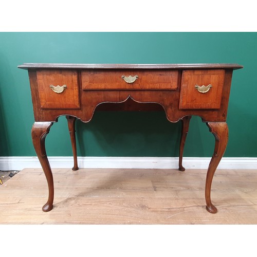 760 - A Walnut dressing table on Cabriole legs with pad feet, 2ft 7