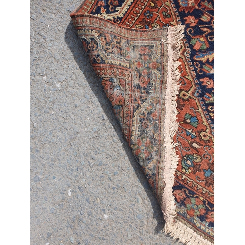 208A - An antique Persian Heriz Rug 7ft x 4ft 8in