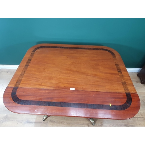 511 - A 19th Century mahogany and rosewood crossbanded Breakfast Table with rectangular top mounted upon f... 