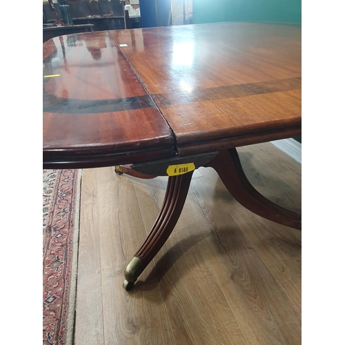 511 - A 19th Century mahogany and rosewood crossbanded Breakfast Table with rectangular top mounted upon f... 