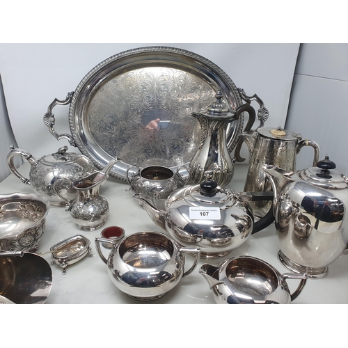 106 - A George V silver three piece circular Condiment Set with gadroon arms, Sheffield 1914/15 and anothe... 