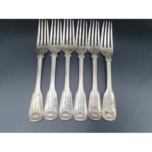 125 - A part set of Victorian silver Cutlery, fiddle thread and shell pattern engraved initials mostly Lon... 