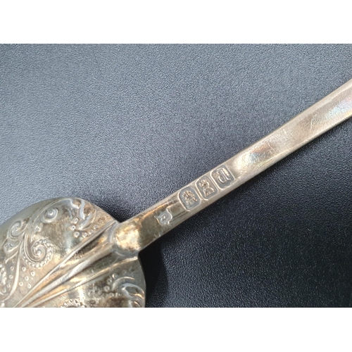 134 - A George III silver Fruit Spoon with gilt berry embossed bowl, floral engraved stem with vacant cart... 