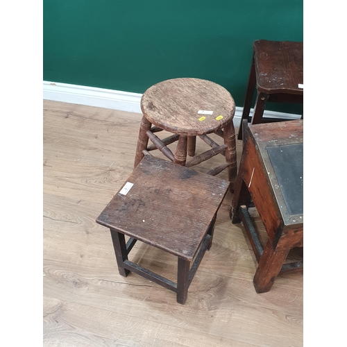 14 - A spindle back Elbow Chair with scrolled arms, circular bentwood style seat, on turned supports and ... 