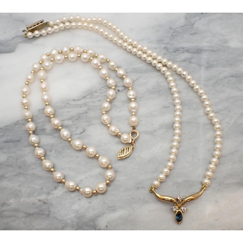 173 - A single row of freshwater Cultured Pearls with gold bead spacers and a Lotus simulated pearl Neckla... 