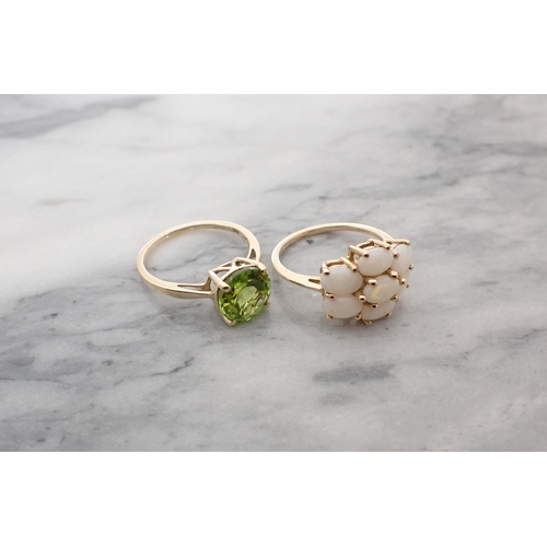 185 - A Peridot Dress Ring claw-set round stone in 9ct gold ring size N and an Opal Cluster ring peg-set s... 