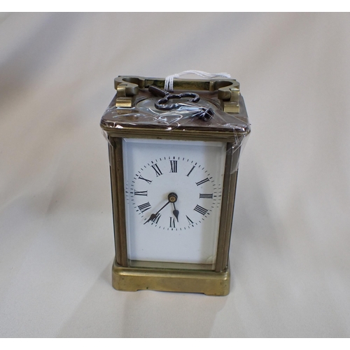 201 - A brass cased Carriage Clock, 5in high