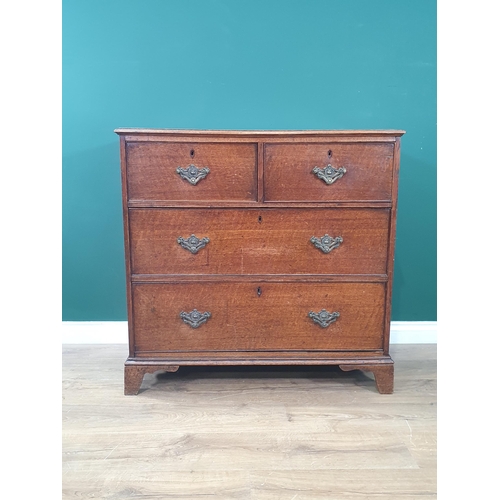 22 - A 19th Century oak Chest of two short and two long drawers raised on bracket feet 3ft 1in W x 3ft H