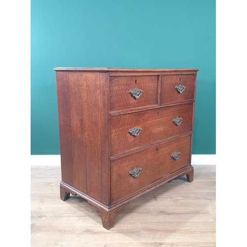 22 - A 19th Century oak Chest of two short and two long drawers raised on bracket feet 3ft 1in W x 3ft H