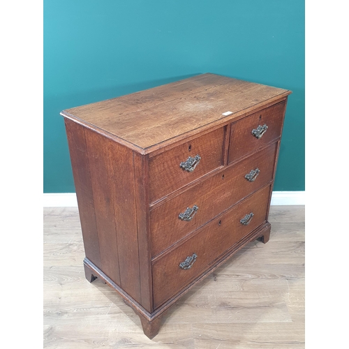 22 - A 19th Century oak Chest of two short and two long drawers raised on bracket feet 3ft 1in W x 3ft H