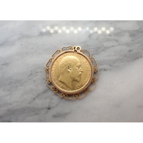 241 - An Edward VII Sovereign 1910 in pendant mount stamped 9ct, approx 9.50gms all in