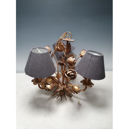 247 - A gilt three branch Ceiling Light in the form of leaves and flowers, 16in H