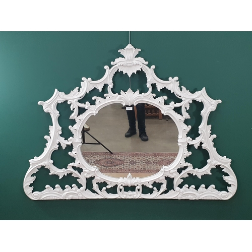 27 - A white painted carved leafage design framed Wall Mirror, 3ft 10