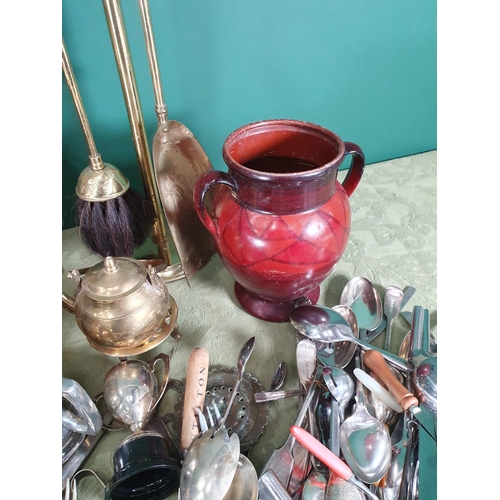 298 - A quantity of brass and plated items including a part Companion Set, Planter, Vases, Cutlery etc