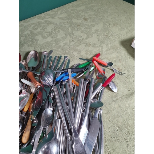 298 - A quantity of brass and plated items including a part Companion Set, Planter, Vases, Cutlery etc