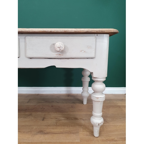 33 - An antique pine scrub top Farmhouse Table with white painted base fitted three frieze drawers on tur... 