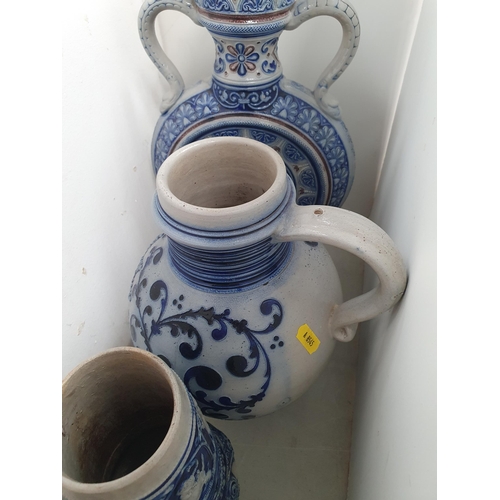 330 - A Westerwald two handled Moon Vase, a Jug and two Vases and two Wedgwood style relief moulded Jugs