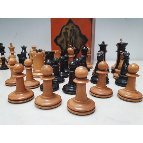 333 - A Staunton style boxwood Chess Set (lacking one pawn) and another boxwood Chess Set, both in tins