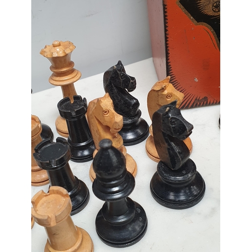 333 - A Staunton style boxwood Chess Set (lacking one pawn) and another boxwood Chess Set, both in tins