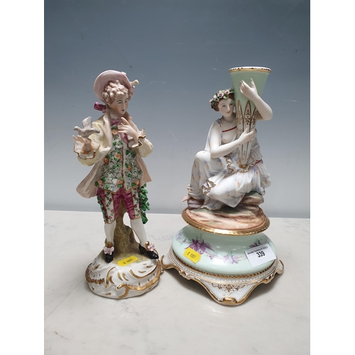 339 - A Continental porcelain figural Candlestick, decorated flowers and gilt to base, 10 1/2 in H, and a ... 