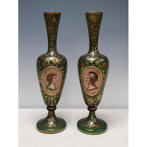 355 - Two 19th Century Bohemian green glass Vases with all over gilt painted leafage scrolling decorations... 