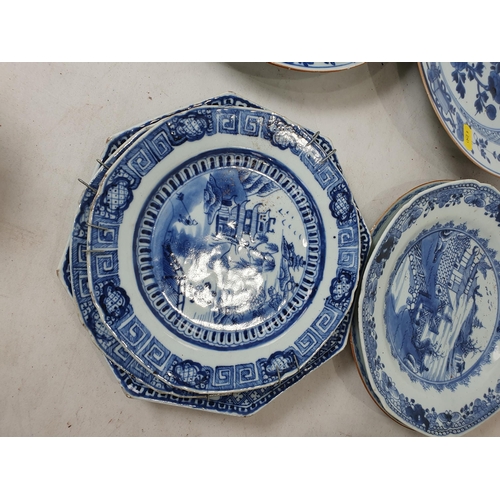 358 - Two 19th Century blue and white Chinese Plates with central floral designs A/F 11