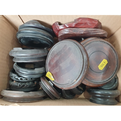 359 - A box of assorted circular hardwood Stands.