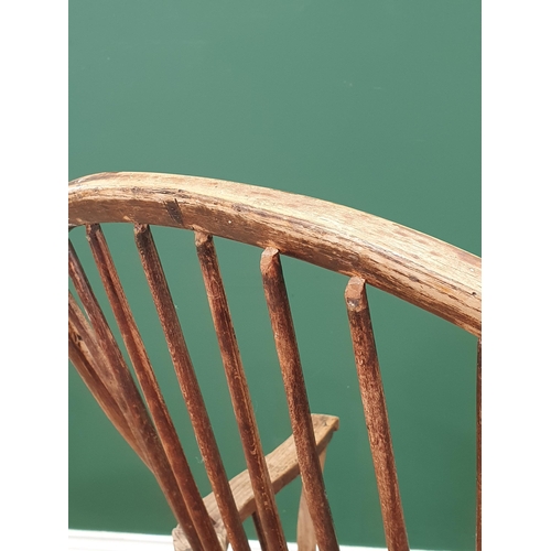 36 - A 19th Century ash and elm stick back Windsor Elbow Chair A/F 3ft 6in H x 2ft 1in W